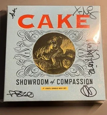 Cake - Showroom of Compassion 7" Boxset Signed - Locked Groove Records