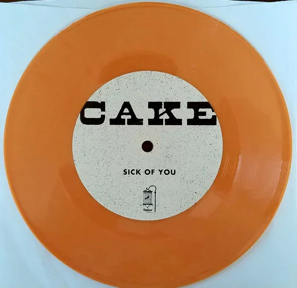 Cake - Showroom of Compassion 7" Boxset Signed - Locked Groove Records