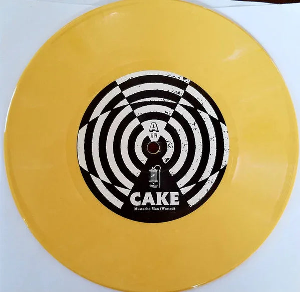 Cake - Showroom of Compassion 7" Boxset Signed - Locked Groove Records